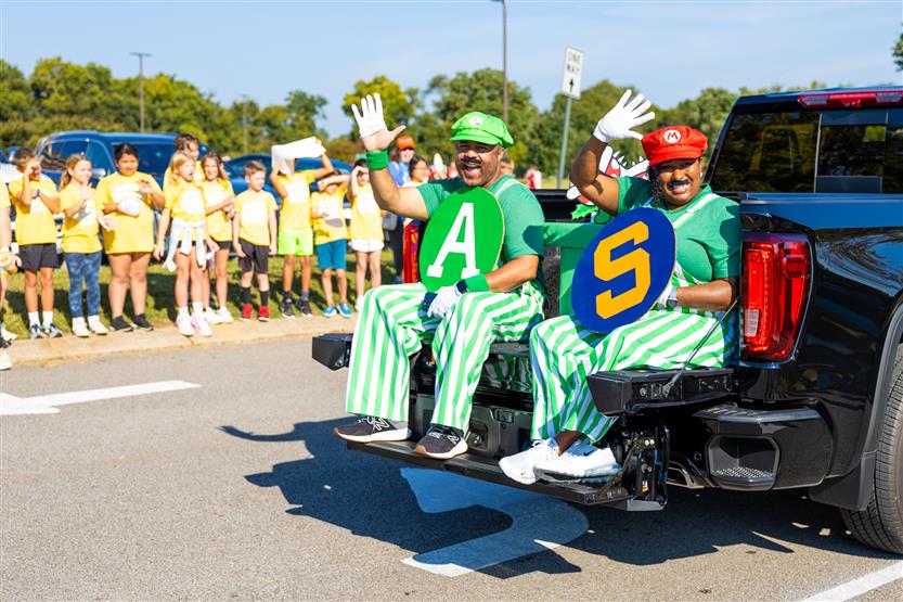 Students at the Summit High homecoming parade